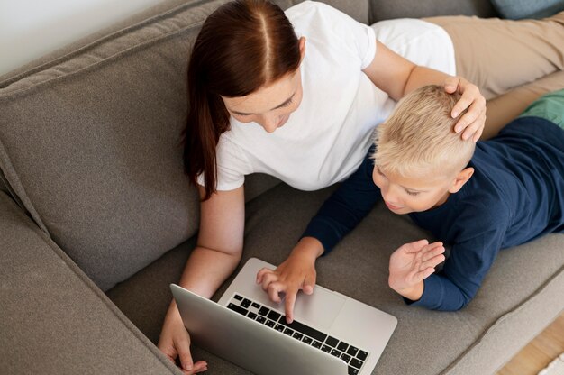 Mom doing a family videocall with her son