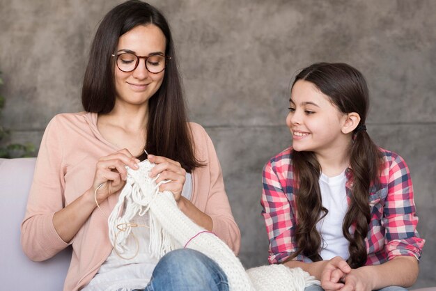 Mom lesson to weave