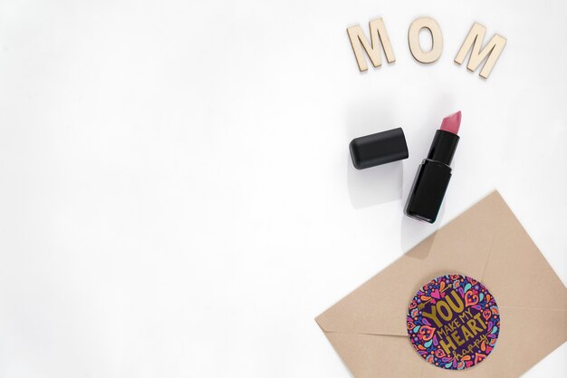 Mom lettering, lipstick and envelope