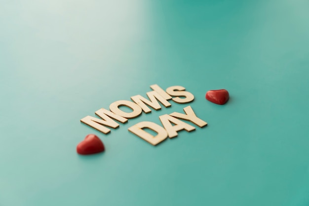 "mom's day" lettering with hearts