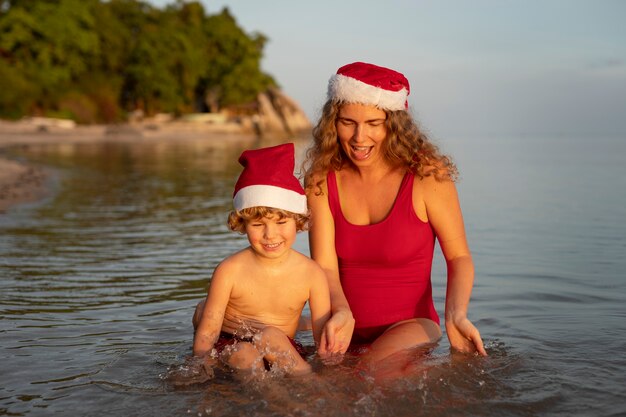 Mom and son celebrating christmas in july