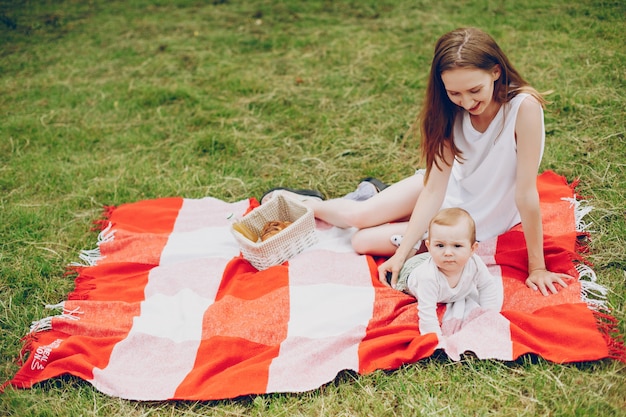 Mom and son relax in the park.