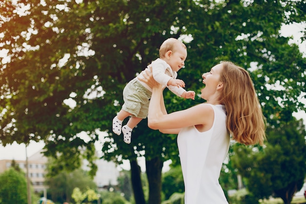 Mom and son relax in the park.