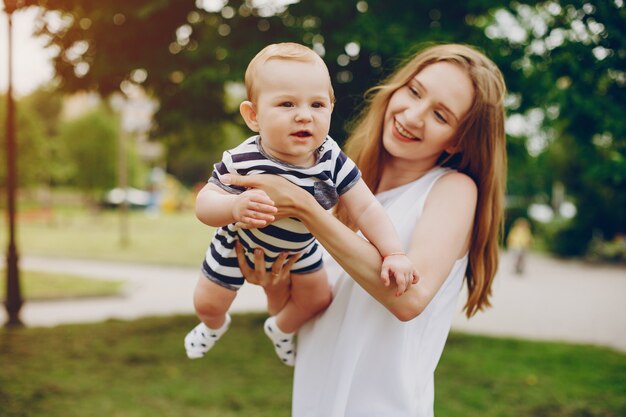 Mom and son relax in the park.