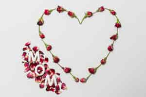 Free photo mom title between red decorative heart of flowers