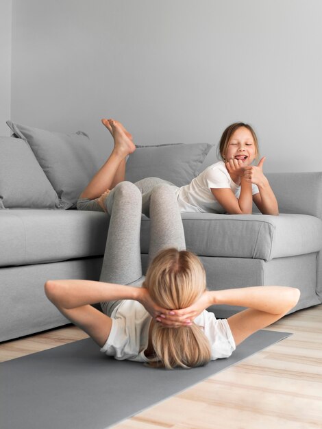 Mom with girl workout