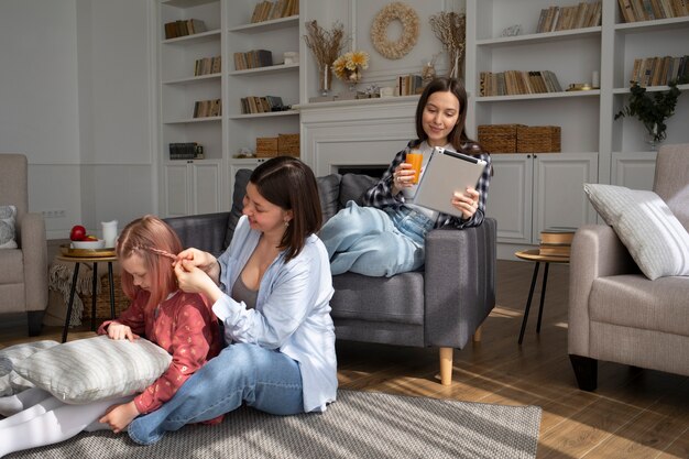 Mommies spending time together with their daughter