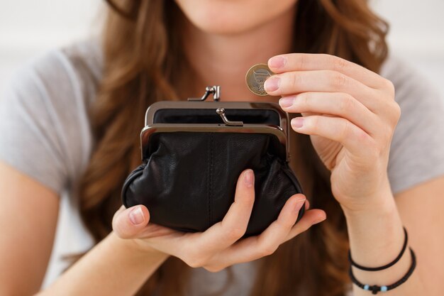 Money, finance. woman with wallet