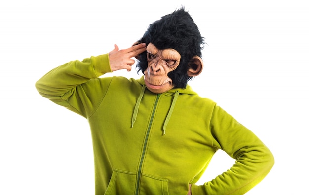 Free photo monkey man making suicide gesture