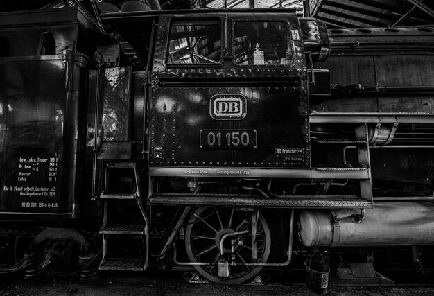 Monochromatic steam-powered historical train 