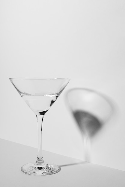 Monochromatic still life composition with glass