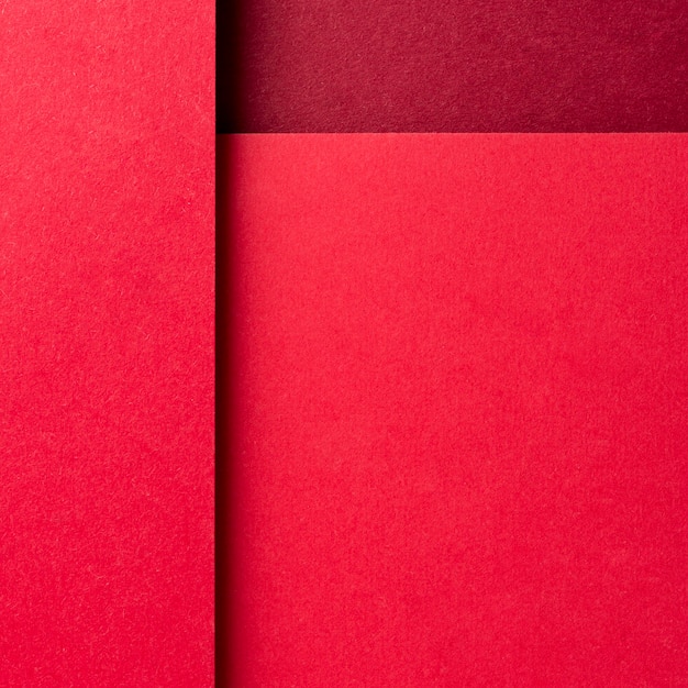 Monochromatic still life composition with red paper