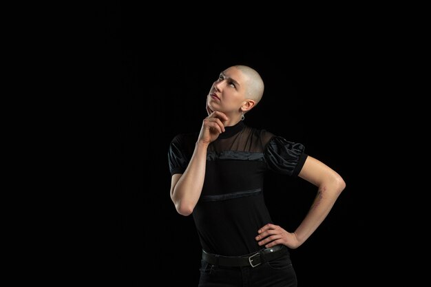 Monochrome portrait of young caucasian bald woman