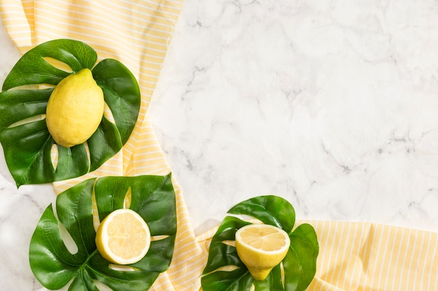 Monstera leaves with lemons