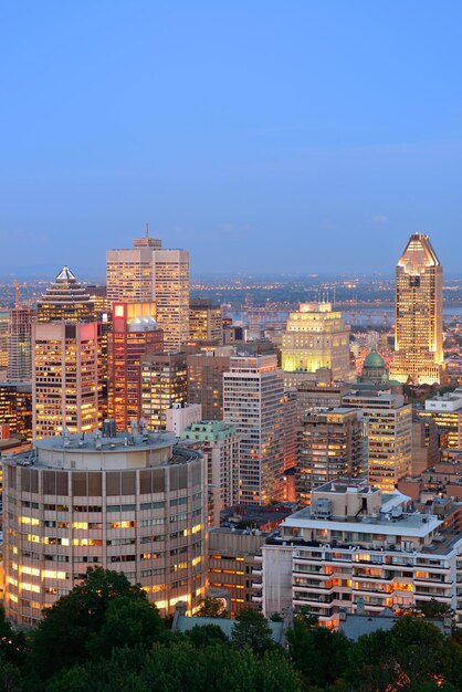 Montreal at dusk with urban skyscrapers viewed from Mont Royal