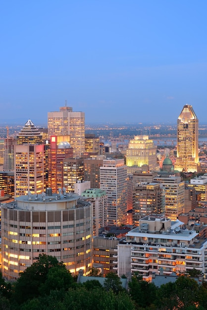 Montreal at dusk with urban skyscrapers viewed from Mont Royal