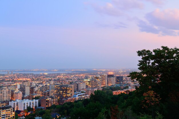 Montreal at dusk with urban skyscrapers viewed from Mont Royal