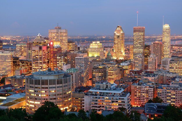 Montreal at dusk with urban skyscrapers viewed from Mont Royal