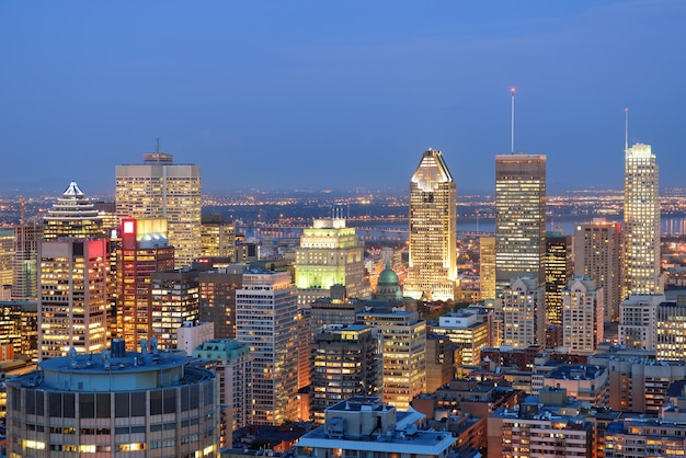 Montreal at dusk with urban skyscrapers viewed from Mont Royal