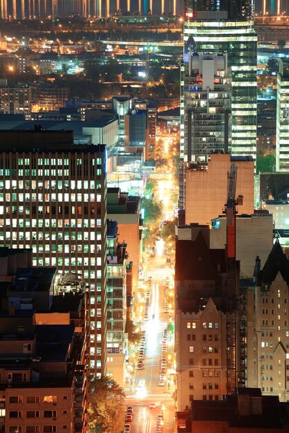 Montreal at dusk with urban skyscrapers viewed from Mont Royal