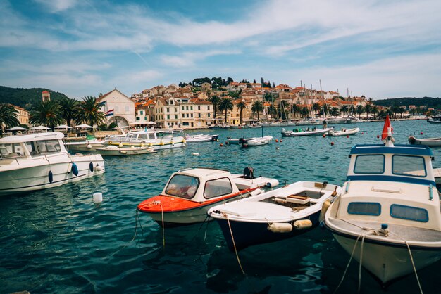 Moored yachts stand in the port town