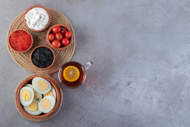 Morning breakfast placed on a marble background.