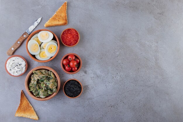 Morning breakfast placed on a marble background.