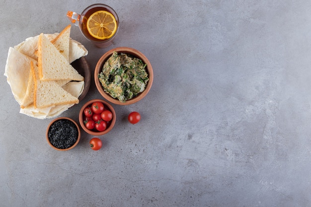 Morning breakfast placed on a marble background.