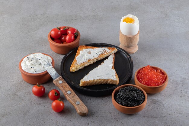 Morning breakfast placed on a marble surface. 