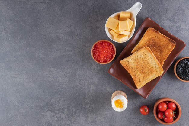 Morning breakfast placed on a marble surface. 