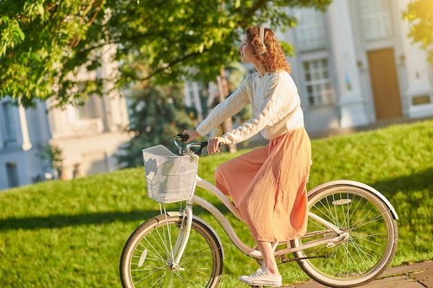 Premium Photo | Morning. ginger girl riding a nike on a sunny morning