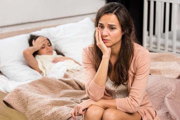 Mother being anxious about her sick daughter