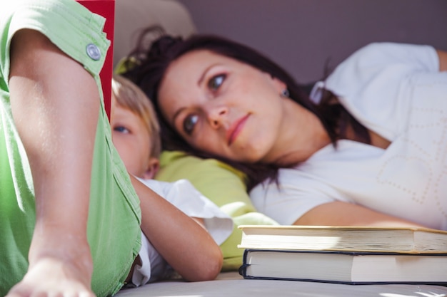 Mother and boy with books