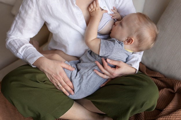 Mother breast feeding her baby