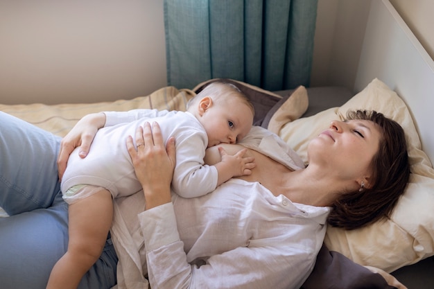 Mother breast feeding her baby