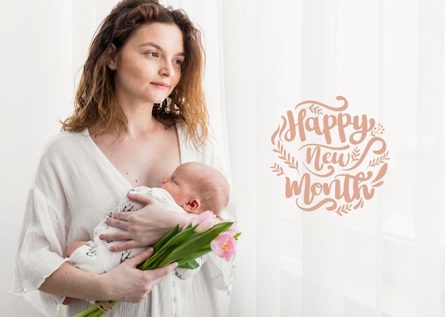 Free photo mother and child with happy new month lettering