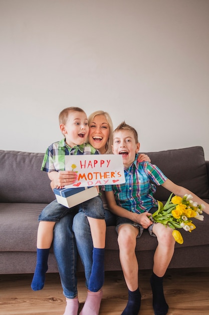 Mother and children with funny faces on mother's day