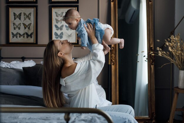 mother and cute baby indoor