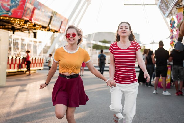 Mother and daughter at amusement park