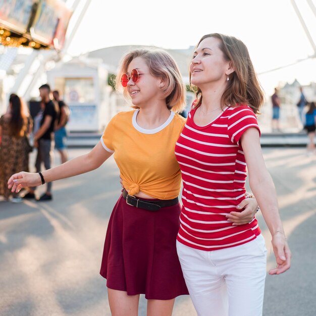 Mother and daughter at amusement park