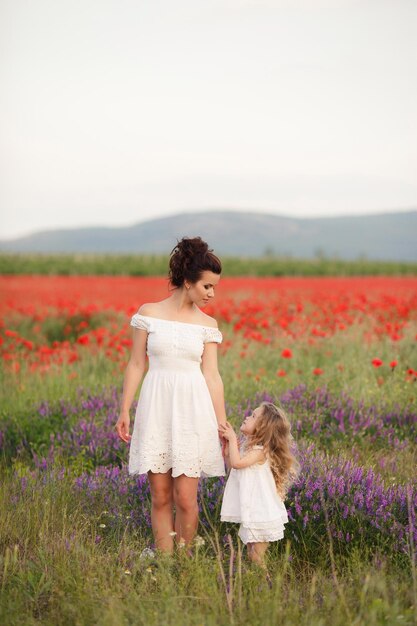 mother and daughter in field outdoor