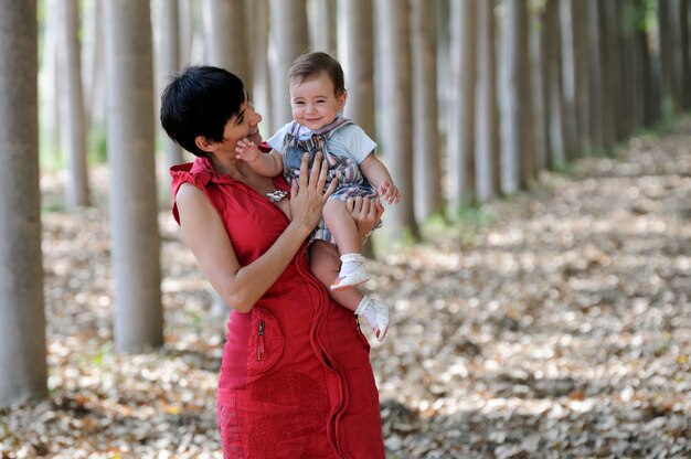 Mother and daughter in the forest