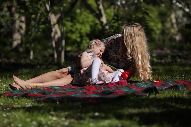 Mother and daughter in the garden