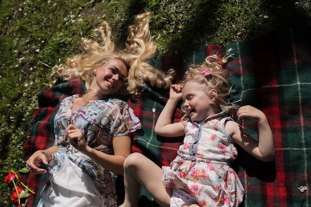 Mother and daughter in the garden