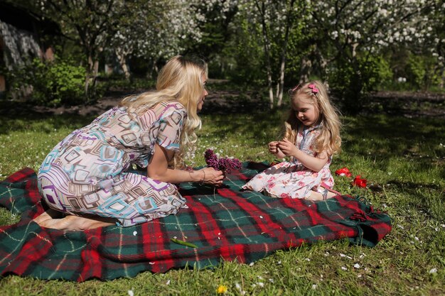 Mother and daughter in the garden