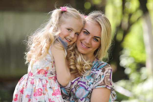 Mother and daughter in the garden