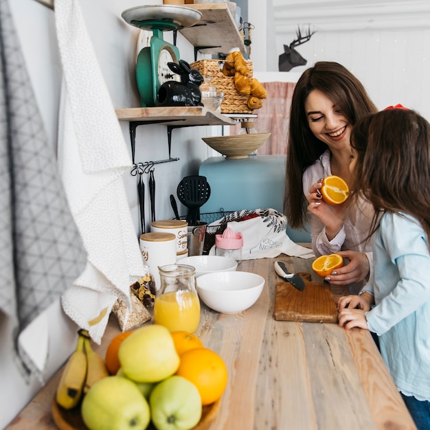 Mother and daughter having breakfast