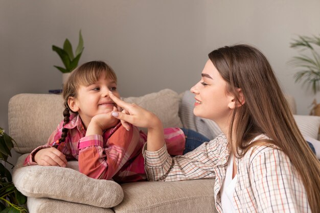 Mother and daughter at home