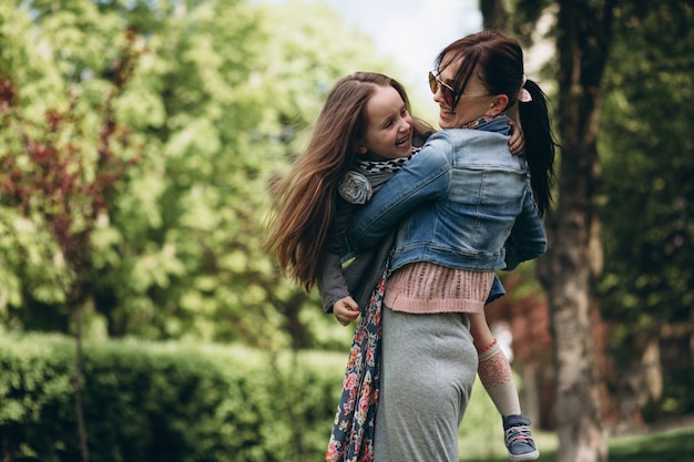 Mother and daughter in park