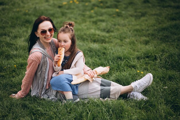 Mother and daughter in park